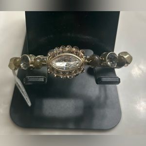 Chico’s gold Bangle bracelet.